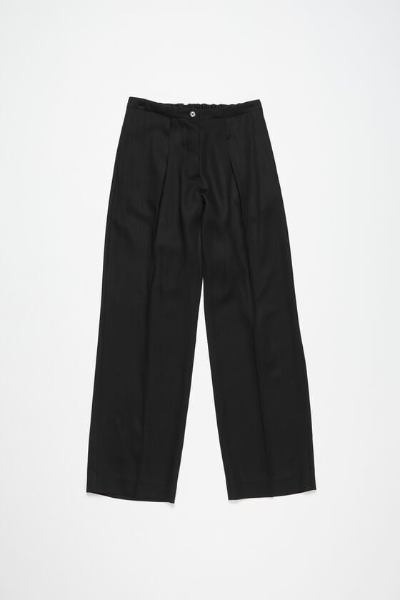 Acne Studios Figurnahe Hose Top Angebot