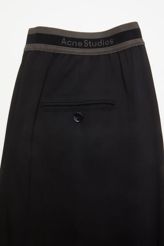 Acne Studios Hose mit Logo-Tape Bestseller