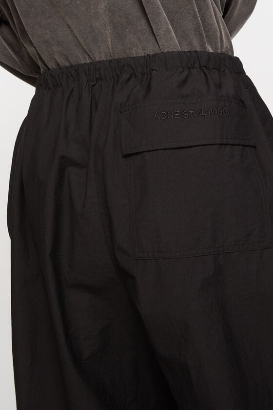 Acne Studios Hose in lockerer Passform Super Sparpreis