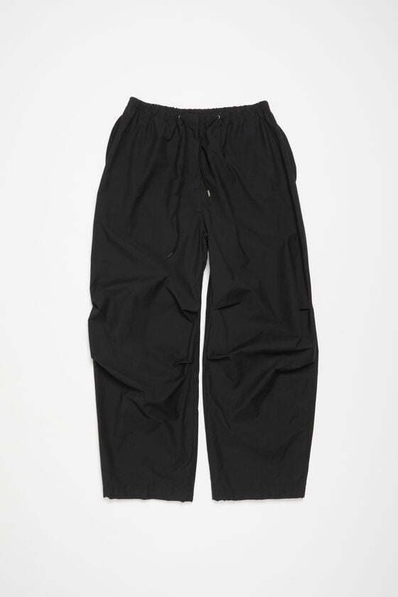 Acne Studios Hose in lockerer Passform Super Sparpreis