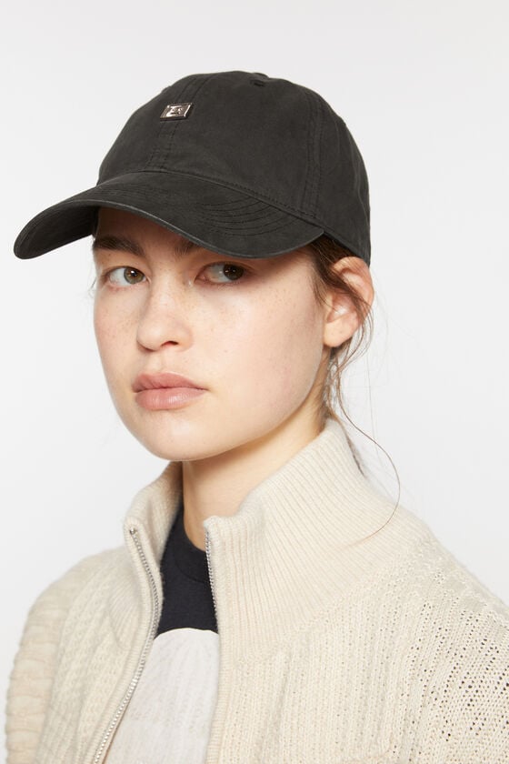 Acne Studios Kappe mit aufgesetztem Face-Aufnäher aus Metall Fabrikladen