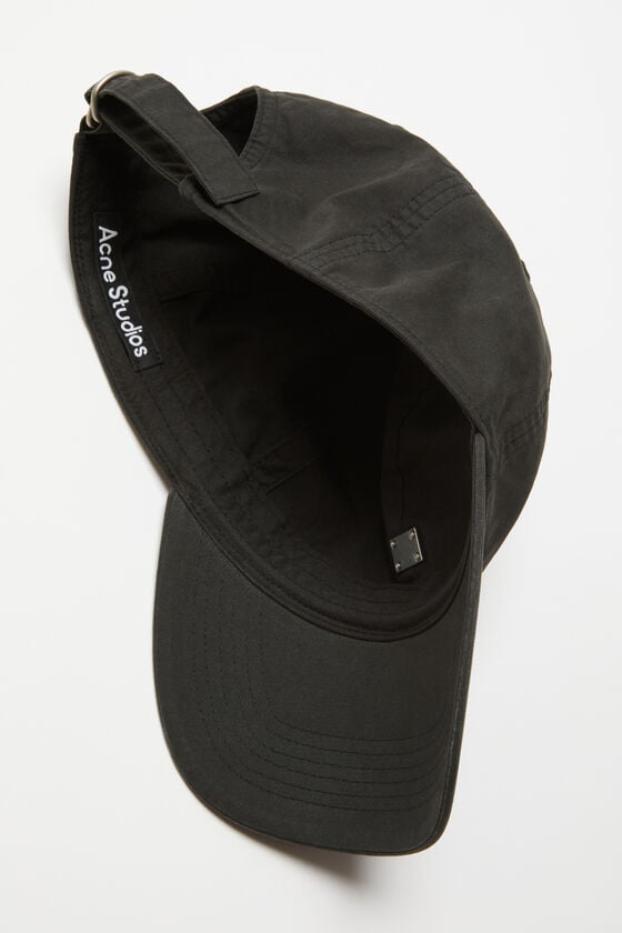 Acne Studios Kappe mit aufgesetztem Face-Aufnäher aus Metall Fabrikladen