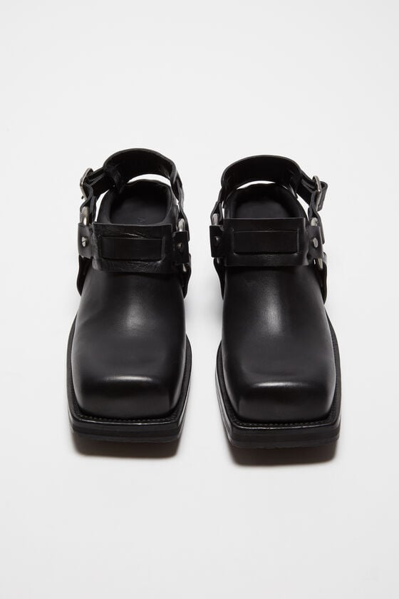 Acne Studios Mules aus Leder mit Schnalle Bis zu 50% Rabatt