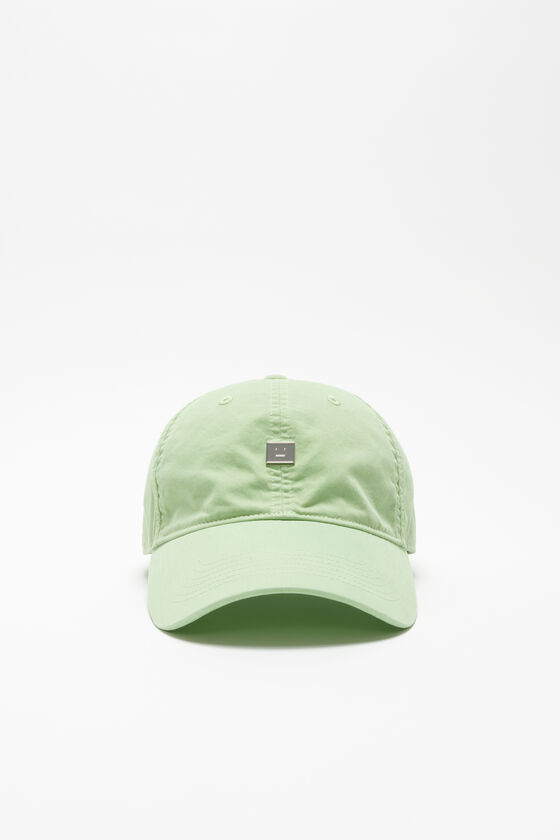 Acne Studios Aufgesetzte Kappe mit Face-Logo