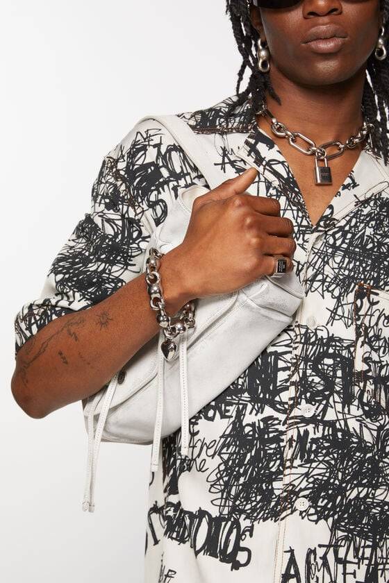 Acne Studios Siegelring mit Logo-Gravur Rabatt